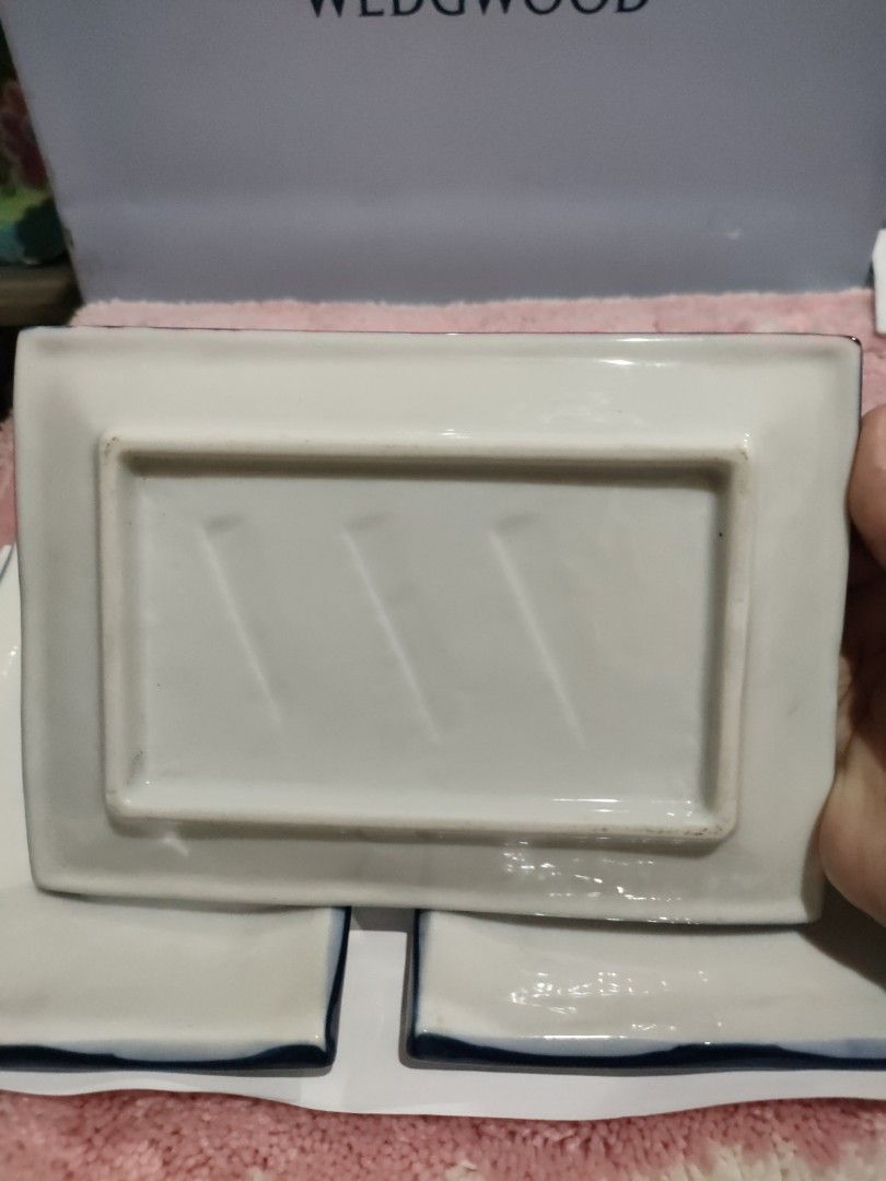 Ceramic rectangular serving plates (Category: Dinnerware & Cutlery) located in Bulacan. Submitted by hunterherojapanjdm (Listing ID 1457498749, Image 2). Description: Set of white ceramic rectangular serving plates with distinct uneven blue rims..