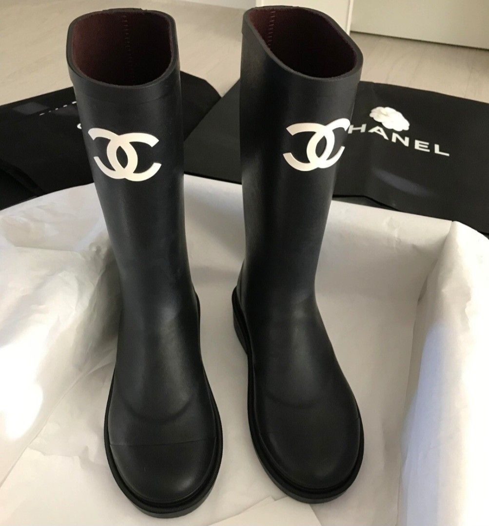 Chanel Black Rubber CC Logo Tall Rain Boots (Category: Sneakers & Footwear) located in Quezon City. Submitted by melmgpy (Listing ID 1457466008, Image 3). Description: - Classic black Chanel rain boots - Iconic CC logo on the side - Tall shaft design - Durable rubber material - Comfortable burgundy interior lining - Comes with original dust bags.
