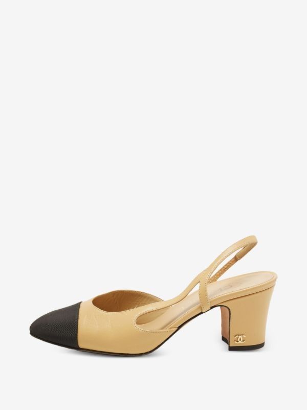 Chanel Slingback Heels Beige Black Cap Toe Slingbacks (Category: Sneakers & Footwear) located in Quezon City. Submitted by melmgpy (Listing ID 1457463553, Image 2). Description: - Classic Chanel slingbacks - Beige leather with black cap toe - Secure slingback strap - Comfortable block heel - Iconic CC logo detail on heel - Versatile for dressing up or down - Timeless and iconic design.