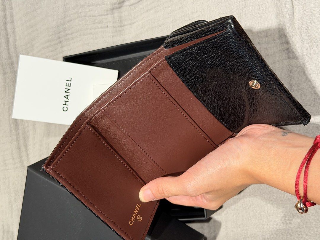 Chanel Trifold Wallet in Caviar Leather (Category: Luxury Bags & Wallets) located in Manila. Submitted by petitecherieee (Listing ID 1457491663, Image 3). Description: - Chanel - Small Trifold Wallet - Material: Genuine Caviar Leather - Classic caviar with iconic silver hardware CC logo - Used once - Includes: Original Chanel box and authenticity cards - Meetup locations: Rockwell Center (Makati) or Greenbelt 5 (Makati).