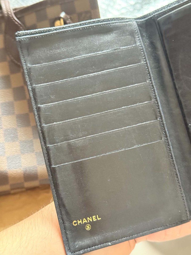 Chanel Wallet Authentic Black Leather Card Holder (Category: Luxury Bags & Wallets) located in Manila. Submitted by akivituh.ph (Listing ID 1457471189, Image 3). Description: - Authentic Chanel wallet - Black pebbled leather with embossed CC logo - Ample card slots for organization - Elegant gold hardware details - Comes with LegitGrails authentication certificate (Order #176676) - Verified authentic Price is still negotiable for sure buyer plus 