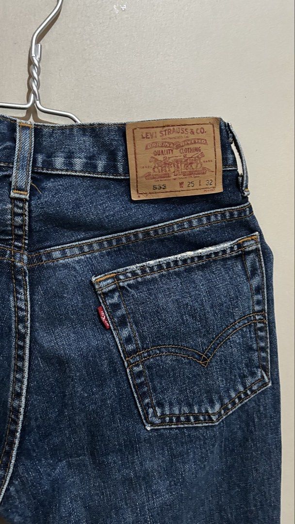 Classic Levi's 517 Bootcut Jeans. (Category: Jeans) located in Baliuag. Submitted by declutterbynadz (Listing ID 1457217439, Image 2). Description: Fit: Fitted through the thigh with a slim mid-rise. Leg Opening: Classic bootcut silhouette that flares slightly from the knee down. Wash: Dark-to-medium indigo stonewash with subtle natural fading along the thighs. Construction: Traditional 5-pocket design with a zip-fly closure..
