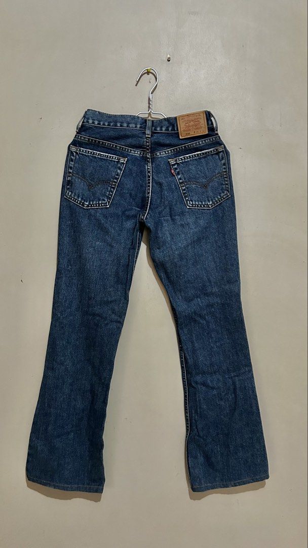 Classic Levi's 517 Bootcut Jeans. (Category: Jeans) located in Baliuag. Submitted by declutterbynadz (Listing ID 1457217439, Image 3). Description: Fit: Fitted through the thigh with a slim mid-rise. Leg Opening: Classic bootcut silhouette that flares slightly from the knee down. Wash: Dark-to-medium indigo stonewash with subtle natural fading along the thighs. Construction: Traditional 5-pocket design with a zip-fly closure..