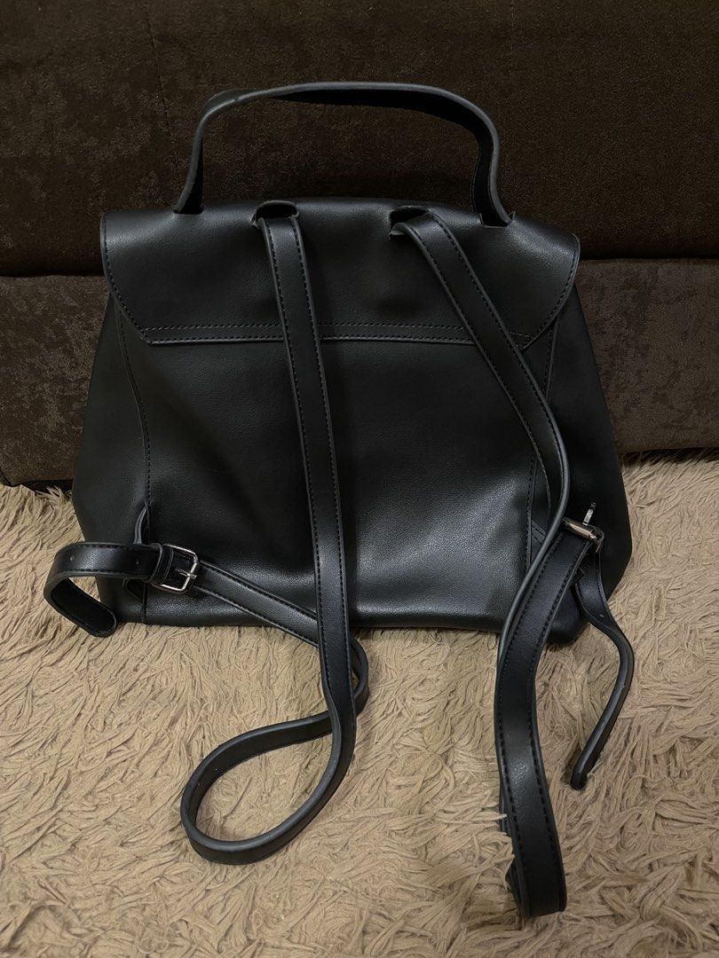 CLN Black Leather Backpack (Category: Backpacks) located in Mandaluyong City. Submitted by lovxlle (Listing ID 1457430359, Image 2). Description: CLN black leather backpack with adjustable sides Shipping fee will be shouldered by buyer Rfs: decluttering MOP: Gcash or Bank Transfer MOD: Lalamove or Grabexpress.