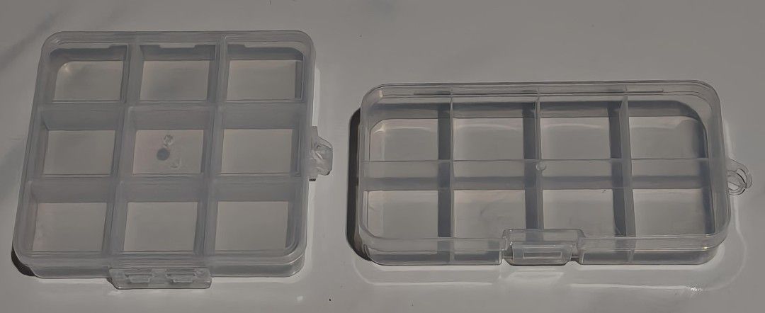 Compartment PP boxes (Category: Storage Boxes & Baskets) located in Singapore. Submitted by ICEcream555 (Listing ID 1457500436, Image 1). Description: - Durable PP plastic compartment boxes 1 for $5 2 for $8 - Available in two sizes: 9-compartment square (approx. 10cm x 9.7cm x 1.75cm) 10-compartment rectangular (approx. 12.8cm x 6.5cm x 2.2cm) - Clear design for easy visibility of contents. - ideal for keep earrings, jewelry all medication .