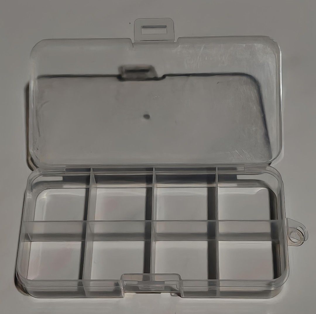 Compartment PP boxes (Category: Storage Boxes & Baskets) located in Singapore. Submitted by ICEcream555 (Listing ID 1457500436, Image 3). Description: - Durable PP plastic compartment boxes 1 for $5 2 for $8 - Available in two sizes: 9-compartment square (approx. 10cm x 9.7cm x 1.75cm) 10-compartment rectangular (approx. 12.8cm x 6.5cm x 2.2cm) - Clear design for easy visibility of contents. - ideal for keep earrings, jewelry all medication .