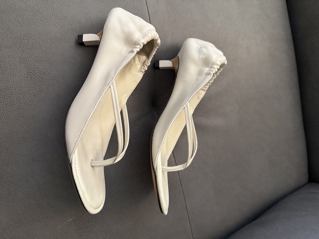 Cream Ruched Thong Kitten Heel Sandals (Category: Heels) located in Binan City. Submitted by iamptetty (Listing ID 1455376961, Image 2). Description: - Fits size US 7,6, and 5.5 since this is garterized - Cream thong sandals - Ruched detail at the top - Low kitten heel - Genuine leather upper and lining - Chic and minimalist design - Versatile: dress up or down.