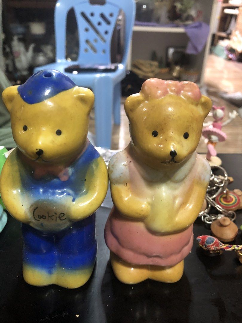 Cute Bear Salt and Pepper Shakers (Category: Food Organization & Storage) located in Manila. Submitted by noemiaspa1702 (Listing ID 1457393001, Image 1). Description: - Adorable bear salt and pepper shakers - Boy bear in blue overalls with 'cookie' text and blue cap - Girl bear in pink dress with pink bow - Ideal for kitchen decor - Makes a great gift - Adds a fun touch to any table setting.