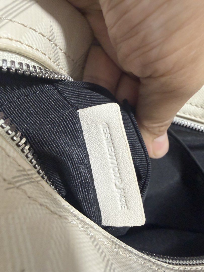 Dior Monogram Crossbody Bag (Category: Luxury Bags & Wallets) located in Antipolo. Submitted by declutteringirlie0317 (Listing ID 1457452097, Image 3). Description: - Authentic Christian Dior crossbody bag - Iconic all-over Dior monogram pattern - Secure zip closure main compartment - Convenient interior slip pocket - Adjustable strap for comfortable wear - Comes with original dust bag - Expertly crafted in Italy -bought from Japan seller -used o