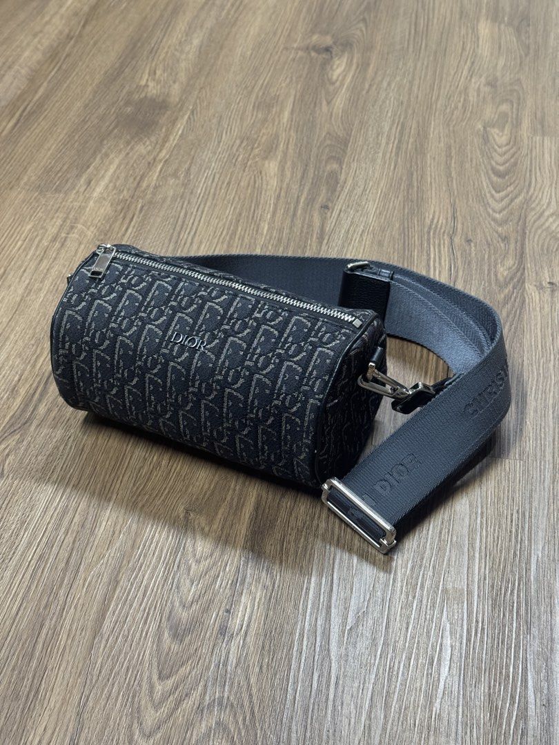 Dior Oblique Roller Messenger Bag (Category: Luxury Bags & Wallets) located in Makati City. Submitted by grail_luxury (Listing ID 1457432273, Image 1). Description: Condition: Excellent (9/10) Bag only Dimensions | L8.25in × H4.75in x W4.75in Phone Fit: Fits an iPhone Pro Max Material: Monogram canvas Features: Adjustable logo canvas strap with silver hardware, black fabric interior Signs of Use: Some scratches on hardware, some minor dirt on can