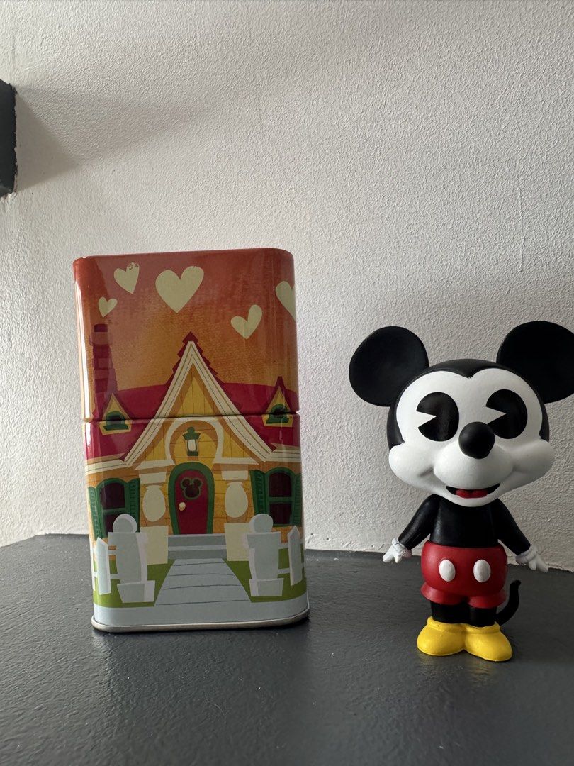 Disney Mickey Mouse Funko Pop & Tin House (Category: Designer & Blind Box Toys) located in Las Pinas. Submitted by raiamrl (Listing ID 1457381113, Image 1). Description: - Mickey Mouse Funko Pop figure in classic outfit. - Decorative tin house with cute heart design. - Ideal for Disney collectors and fans..