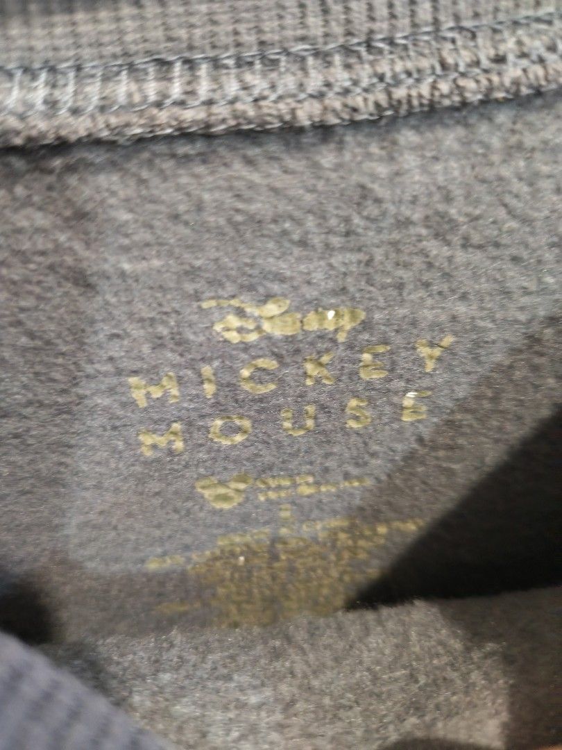 Disney Mickey Mouse Grey Crewneck Sweatshirt (Category: Coats, Jackets and Outerwear) located in Marikina City. Submitted by noemitee (Listing ID 1457417707, Image 2). Description: - Grey crewneck sweatshirt - Classic Mickey Mouse graphic (red shorts, yellow shoes) - Long sleeves - Comfortable fit - Ideal for casual wear - A must-have for Disney fans.