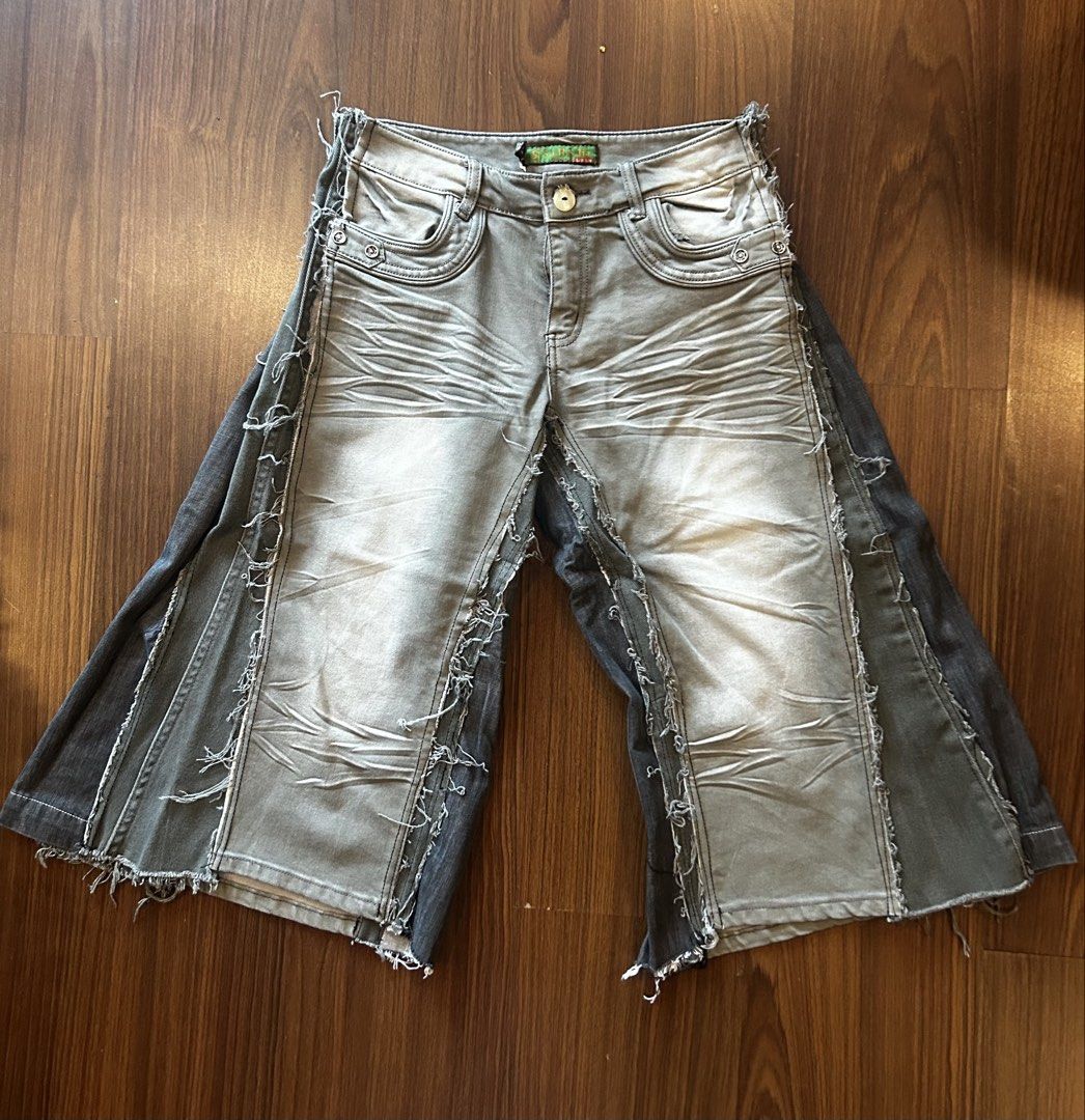 Distressed Patchwork Jorts (Category: Jeans) located in Manila. Submitted by bbstyle___ (Listing ID 1457374715, Image 1). Description: -Waist 29 - Unique patchwork wide-leg jeans - Light grey denim with contrasting dark denim side panels - Distressed detailing for an edgy vibe - Frayed hems - Perfect for making a bold fashion statement.