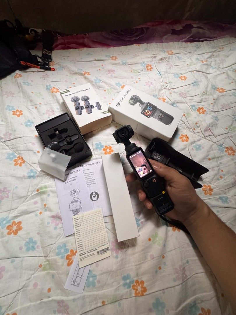 DJI Osmo Pocket 3 with TNW Wireless Lavalier Microphone (Category: Microphones) located in Caloocan City. Submitted by eyeshieldtwentyone20-13490 (Listing ID 1457381582, Image 3). Description: - DJI Osmo Pocket 3 camera (out of box, as pictured) - TNW W17 wireless lavalier microphone set (brand new, sealed) - Original boxes included for both items - Ideal for vlogging and content creation.