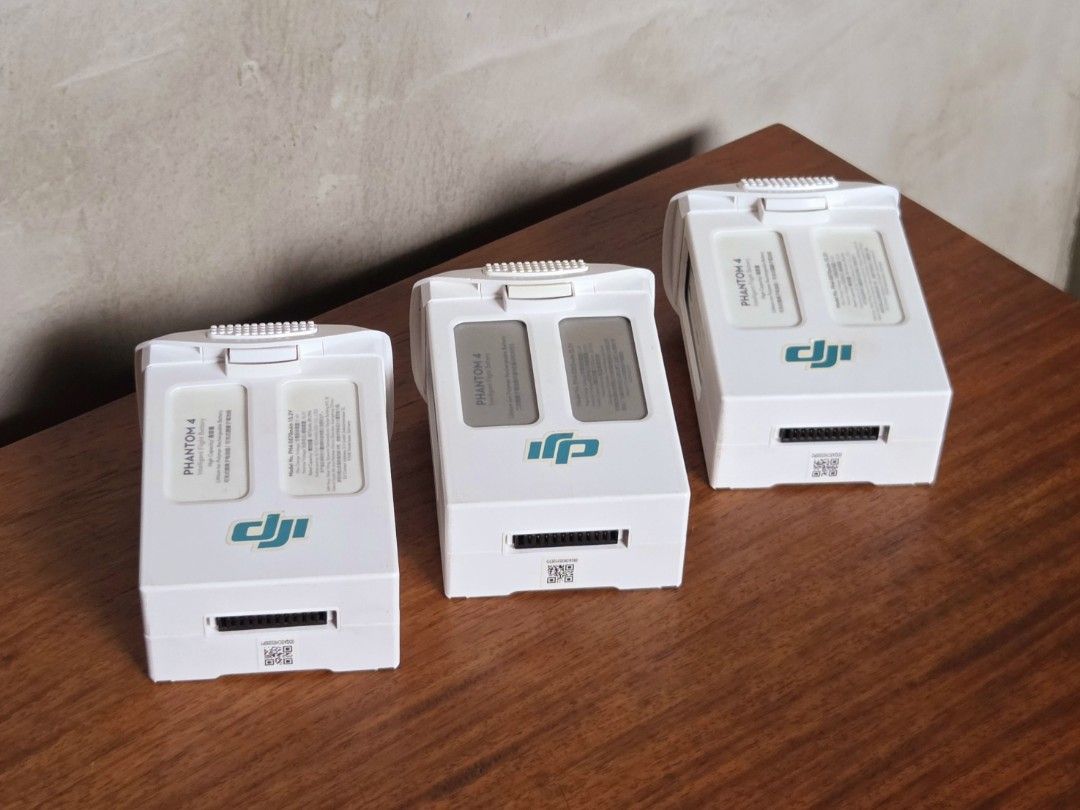 DJI Phantom 4 Drone RC (Category: Drones) located in Pasig City. Submitted by ge_borro (Listing ID 1457347347, Image 2). Description: DJI Phantom 4 • Complete with remote, hardcase, 3 batteries in good condition, 3 sets of propellers, charger and cables, gyro protector, tablet-holder extender •Shows signs of use, honest issue is repaired landing gear, but still flies well without any issues *Will remove other stickers upon sale of unit *SD Card n