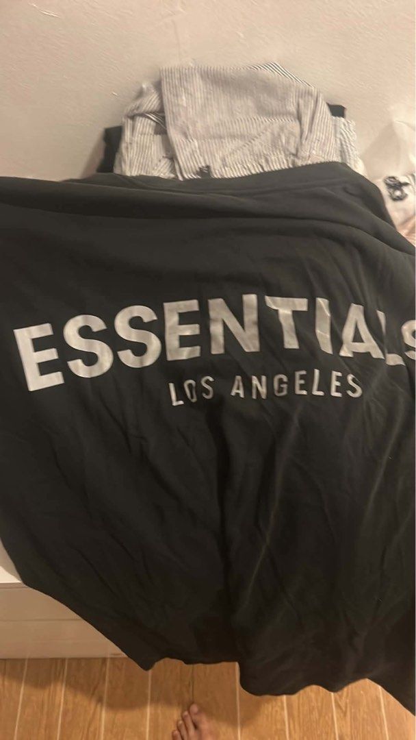 Essentials Shirt (Category: Tshirts & Polo Shirts ) located in Manila. Submitted by offsetx (Listing ID 1457452409, Image 2). Description: Essentials Los Angeles Shirt Size XL on tag No issues 800 Essentials Tee Size LARGE on tag No issues 700 Decluttering sale not using it anymore Can do pickup/shipping/meetup .