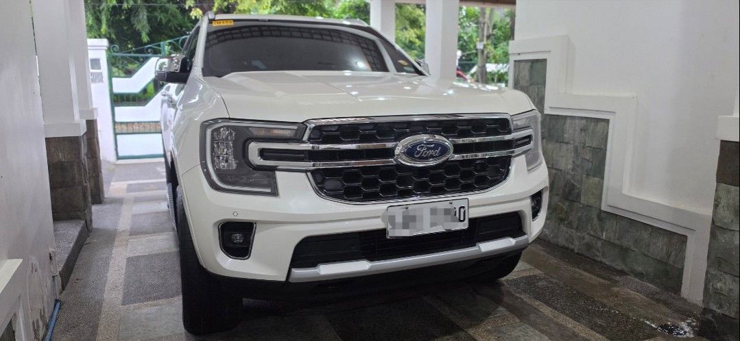 Ford Everest (Category: Used Cars) located in Quezon City. Submitted by brand_bargains (Listing ID 1452984187, Image 2). Description: 2023 Ford Everest Titanium+ 4x2AT 37km original mileage 1st owner Snowflake White Pearl Clean Title Original CR & OR not encumbered Friday Coding Registered until Oct 2026 Loc: North Caloocan near SM Caloocan Price: 1.45M well maintained with complete service receipts and records. Ceramic coated. All stock. No acci