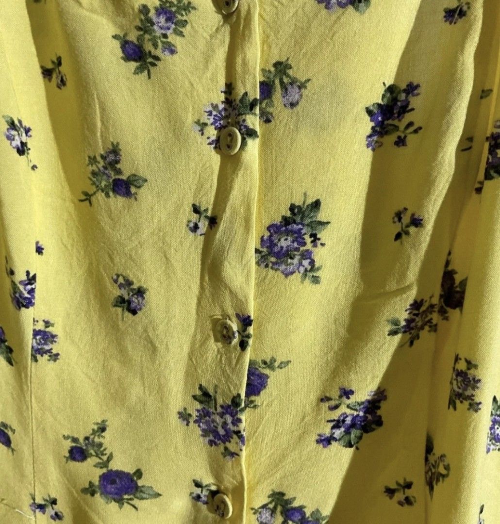 Forever 21 Yellow Floral Button-Up Mini Dress (Category: Dresses) located in Cavite. Submitted by house_of_tabitha (Listing ID 1457514941, Image 3). Description: - Cute yellow mini dress - Purple floral print - Button-up front - Spaghetti straps - Lightweight fabric - Ideal for warm weather, beach days, or casual outings - Versatile styling with sandals or sneakers .
