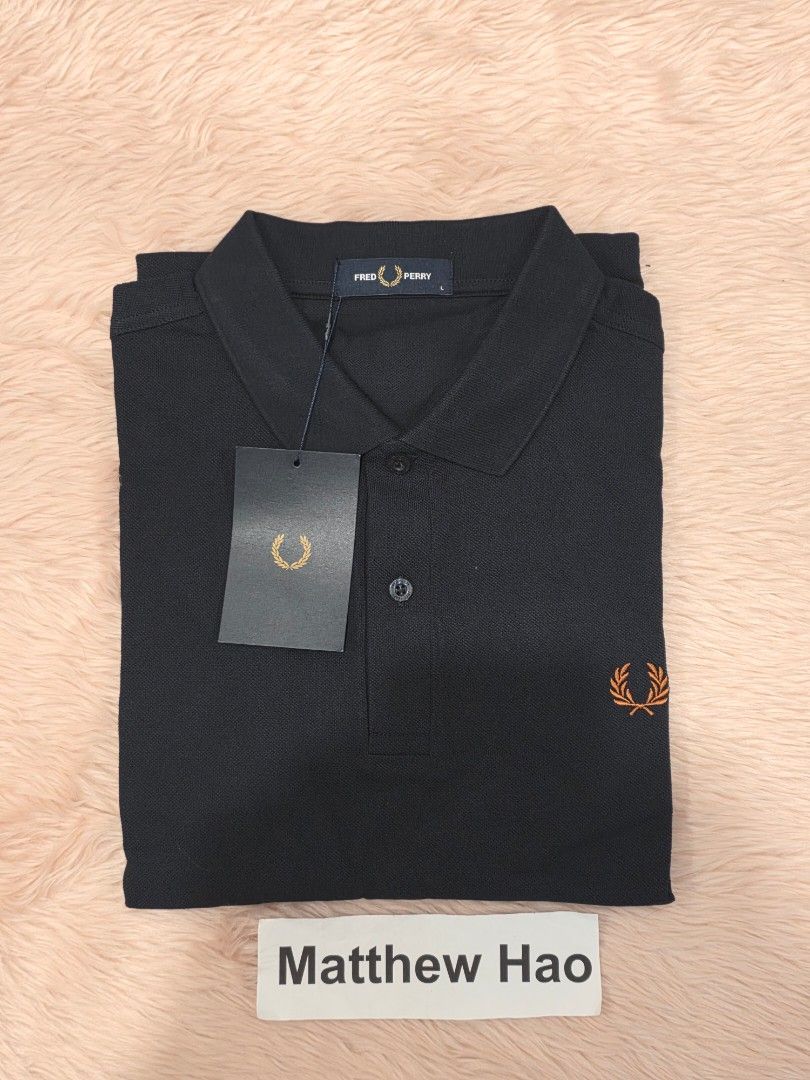 Fred perry polo shirt m6000 navy (Category: Tshirts & Polo Shirts ) located in Manila. Submitted by machoxmatt (Listing ID 1457388274, Image 2). Description: brandnew size: large (w21, L28.5) color: navy mop:bdo/gcash shipping at buyer's expense.