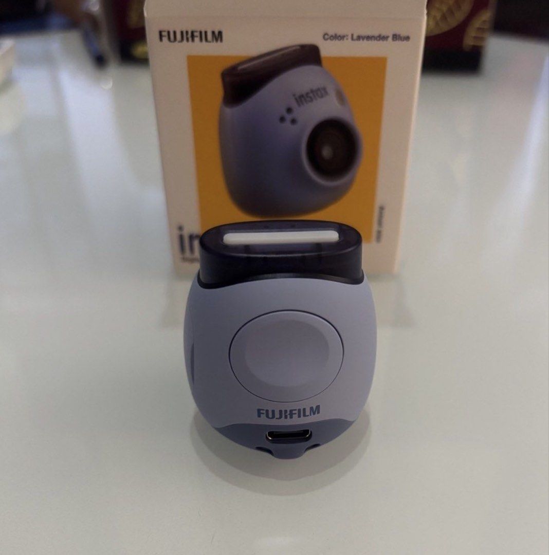 Fujifilm Instax Pal Digital Camera - Lavender Blue (Category: Cameras) located in Makati City. Submitted by shukufukucy (Listing ID 1457429320, Image 3). Description: - Fujifilm Instax Pal digital camera - Color: Lavender Blue - Super compact and portable design - Capture photos and create animations from photo sequences - Customizable pre-shutter sounds - Includes charging cable and user guide.