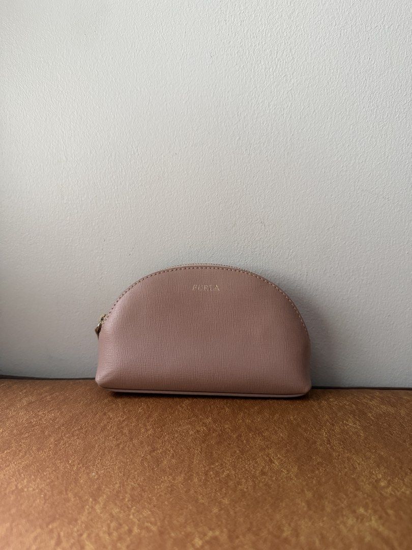 Furla Dome Pouch in Blush Pink (Category: Purses & Pouches) located in Pasay City. Submitted by elleventh (Listing ID 1457411473, Image 1). Description: Furla Blush Pink Dome Pouch — Rank A (9/10) — 6” x 3.8” x 1.3” Selling for only ₱1950 All items are guaranteed authentic and are personally curated and sourced by the founder. If you wish to get a certificate of authenticity from a trusted third party company, you may message us for more details.