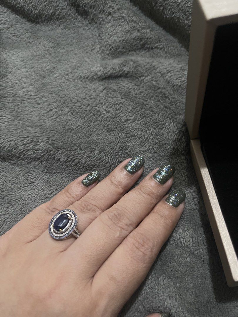 GCL Certified Sapphire Diamond Ring and Earrings Set (Category: Earrings) located in Manila. Submitted by hackelina (Listing ID 1457349742, Image 2). Description: - Beautiful sapphire and diamond ring and matching earrings set in 925 setting. - Certified by GCL. - Ring: Oval blue sapphire surrounded by diamonds. - Earrings: Oval blue sapphires with diamond halos. - Includes a jewelry box. - Ideal for any special occasion..