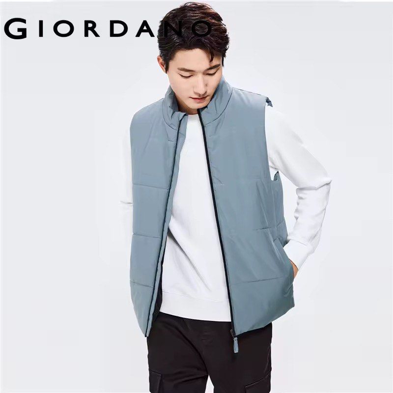 Giordano Puffer Vest - Storm Blue - Size M (Category: Vests) located in Manila. Submitted by iggy.boy (Listing ID 1457505363, Image 1). Description: - Giordano storm blue puffer vest - Brand new (never used, cut tag) - Size M - Stand collar with full zip closure - Two side pockets - Ideal for layering - Comfortable and warm.