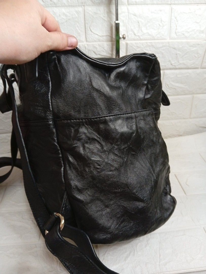 Givenchy Black Leather Wrinkled Backpack (Category: Luxury Bags & Wallets) located in Las Pinas. Submitted by etoksi1234 (Listing ID 1457423147, Image 3). Description: Pre-loved Givenchy Pandora Backpack black crinkled leather bag. featuring gold-tone hardware, dual top zip closures, and the distinct slouchy structural design.