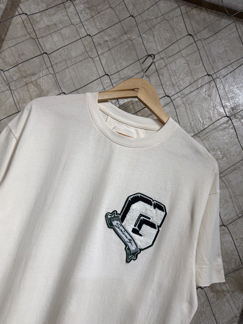 Givenchy College Logo Cream Tee. (Category: Tshirts & Polo Shirts ) located in Manila. Submitted by ardobe.mnl (Listing ID 1457468022, Image 2). Description: Givenchy College Logo Cream Tee. Size: Large Dimes: 21x28 Condition: Excellent Flaw: None! Dm for inquiries! 📥.