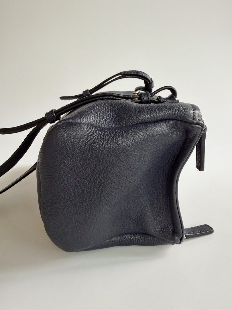 Givenchy Pandora Mini in Deep Navy Blue (Category: Luxury Bags & Wallets) located in Quezon City. Submitted by lian_closet (Listing ID 1457343417, Image 3). Description: Givenchy Pandora Mini in Deep Navy Blue Best Price: ₱28,000 Preloved Comes with Generic Dust Bag & LegitGrails Authenticity Certificate Preloved Rating: 8.9/10 Excellent Light cracks on strap Minimal scratches on hardware Interior is clean.