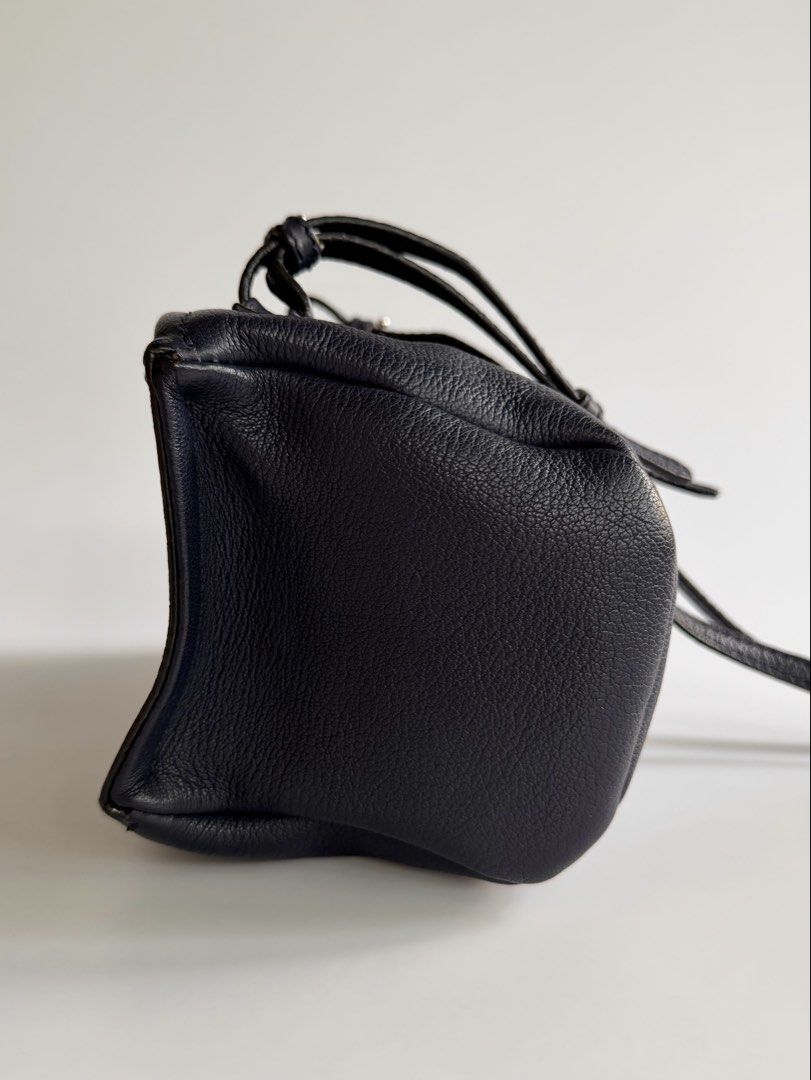 Givenchy Pandora Mini in Deep Navy Blue (Category: Luxury Bags & Wallets) located in Quezon City. Submitted by lian_closet (Listing ID 1457343417, Image 2). Description: Givenchy Pandora Mini in Deep Navy Blue Best Price: ₱28,000 Preloved Comes with Generic Dust Bag & LegitGrails Authenticity Certificate Preloved Rating: 8.9/10 Excellent Light cracks on strap Minimal scratches on hardware Interior is clean.