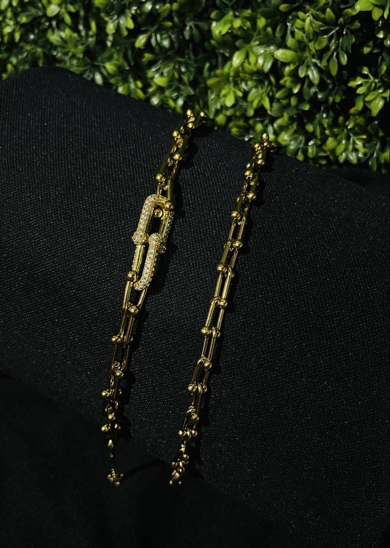 Gold Chain Necklace with CZ Clasp (Category: Necklaces) located in Manila. Submitted by janni4010 (Listing ID 1457345301, Image 1). Description: - Unique gold chain necklace - Features a special clasp with small stones - Mix of bead and link chain segments - Versatile: great for layering or wearing alone - Beautiful shine, suitable for everyday wear.