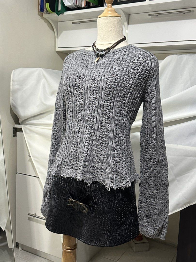 Gray Knitted Curved Tattered Sweater (Category: Coats, Jackets and Outerwear) located in Caloocan City. Submitted by 444keeps (Listing ID 1457428845, Image 2). Description: Soo pretty and body hugging (if sakto sayo yung size) Semi stretch! Size S-Semi L .