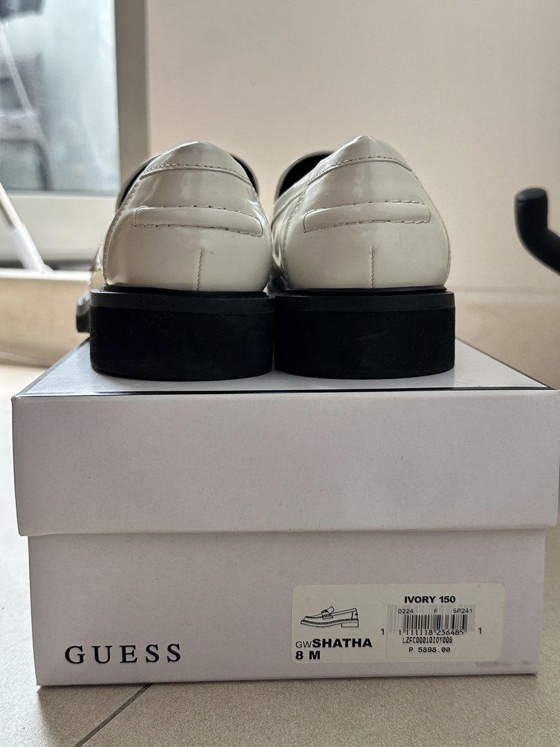 GUESS SHATHA LOAFERS Size 8 | Free sf with MM (Category: Loafers) located in Taguig. Submitted by xxangela69xx (Listing ID 1457377606, Image 2). Description: FOR SALE ❗️Preloved Shoes with Box Actual photos are posted • GUESS SHATHA • Size 8 | Color Ivory • RFS: Decluttering. Hindi na nagagamit. Marami pa akong shoes. • Used twice only • Bought at Ayala Glorietta ORIGINAL PRICE: ₱5,898 Selling price: ₱3,000 ONLY (Negotiable. Just PM me 😉).