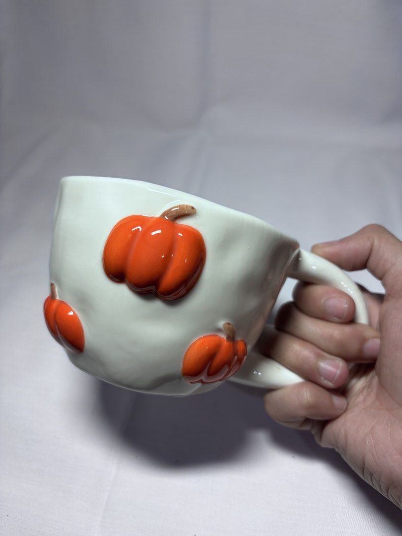 Handmade Ceramic Mug with Pumpkin Design (Category: Coffee & Tea Tableware) located in Sablan. Submitted by 21enygrace.ph (Listing ID 1457457175, Image 1). Description: Not small Personal fave.