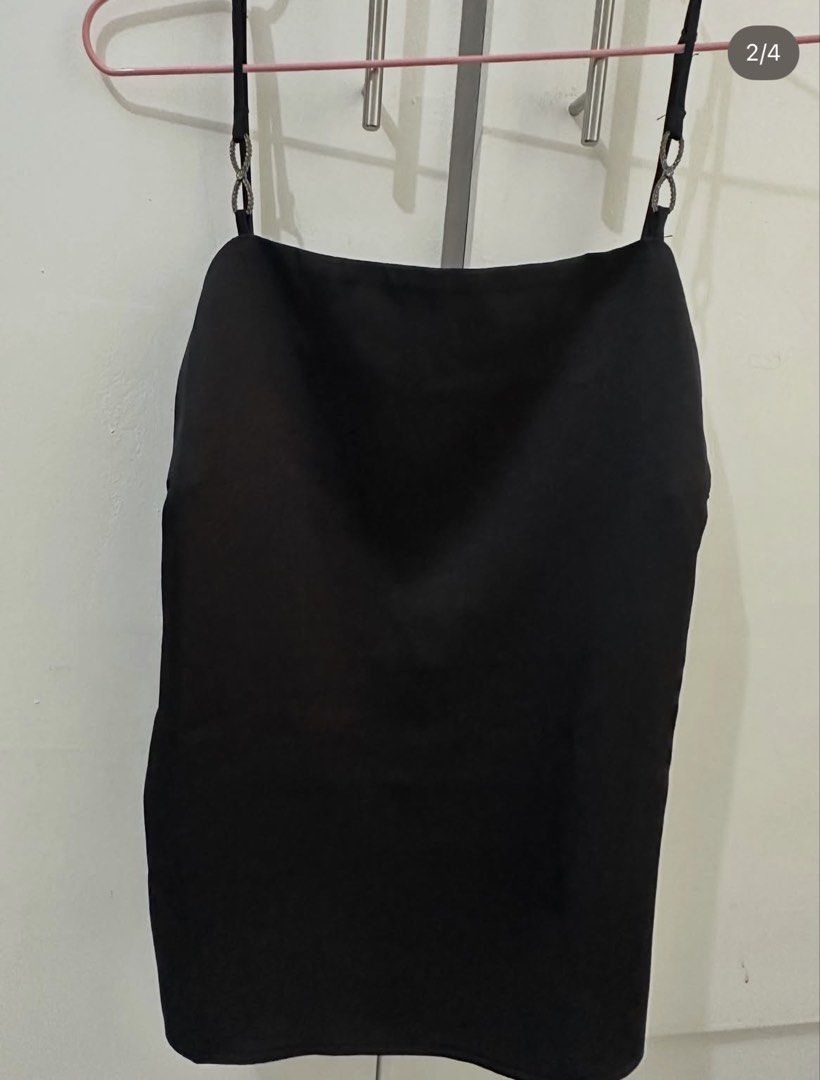 H&M Black Cami Top with Embellished Straps (Category: Sleeveless) located in Abucay. Submitted by kpl0719 (Listing ID 1457426557, Image 2). Description: - Black cami top from H&M - Features a chic square neckline - Unique jeweled strap detail - Perfect for dressing up or down - Size: EUR M / US M.