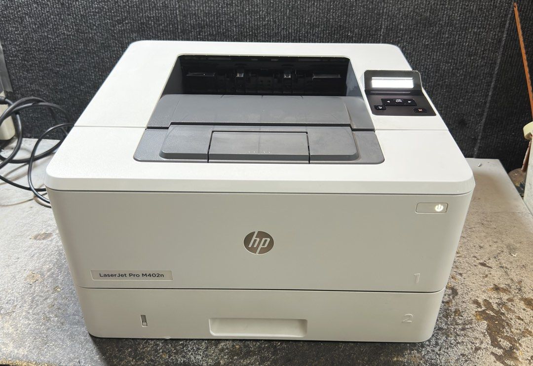 HP LaserJet Pro M402n Printer (Category: Printers, Scanners & Copiers) located in Makati City. Submitted by jtechs (Listing ID 1457480480, Image 1). Description: - HP LaserJet Pro M402n Monochrome Laser Printer - Network-ready for easy sharing - Compact and desk-friendly design - Fast and efficient printing - Ideal for home or office - Includes power cord - Ready for your printing needs.