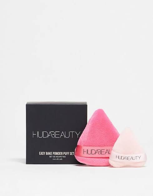 Huda Beauty Easy Bake Powder Puff Set (Category: Makeup) located in Santiago. Submitted by dobongsoon (Listing ID 1457406455, Image 1). Description: - Set of 2 Huda Beauty powder puffs - Includes one large and one small puff - Colors: Pink and light pink - Ideal for makeup baking and setting - Achieve a flawless finish.