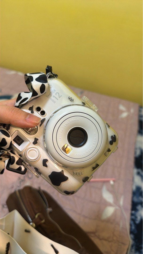 Instax Mini 12 (Category: Cameras) located in Silay City. Submitted by sophiacantiller (Listing ID 1457425817, Image 2). Description: Barely used instax mini with free case and lanyard. Can ship ASAP. PM for last price..