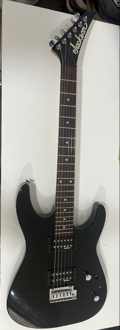 Jackson Dinky JS11 Electric Guitar - Black (Category: Musical Instruments) located in Cebu City. Submitted by llex.ed (Listing ID 1457452278, Image 3). Description: - No issues, buttons and switches are all working - New strings - No paint chips, still has that shiny glossy look - Can demo the guitar for you - NEGOTIABLE.