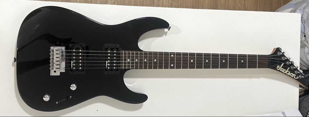 Jackson Dinky JS11 Electric Guitar - Black (Category: Musical Instruments) located in Cebu City. Submitted by llex.ed (Listing ID 1457452278, Image 2). Description: - No issues, buttons and switches are all working - New strings - No paint chips, still has that shiny glossy look - Can demo the guitar for you - NEGOTIABLE.