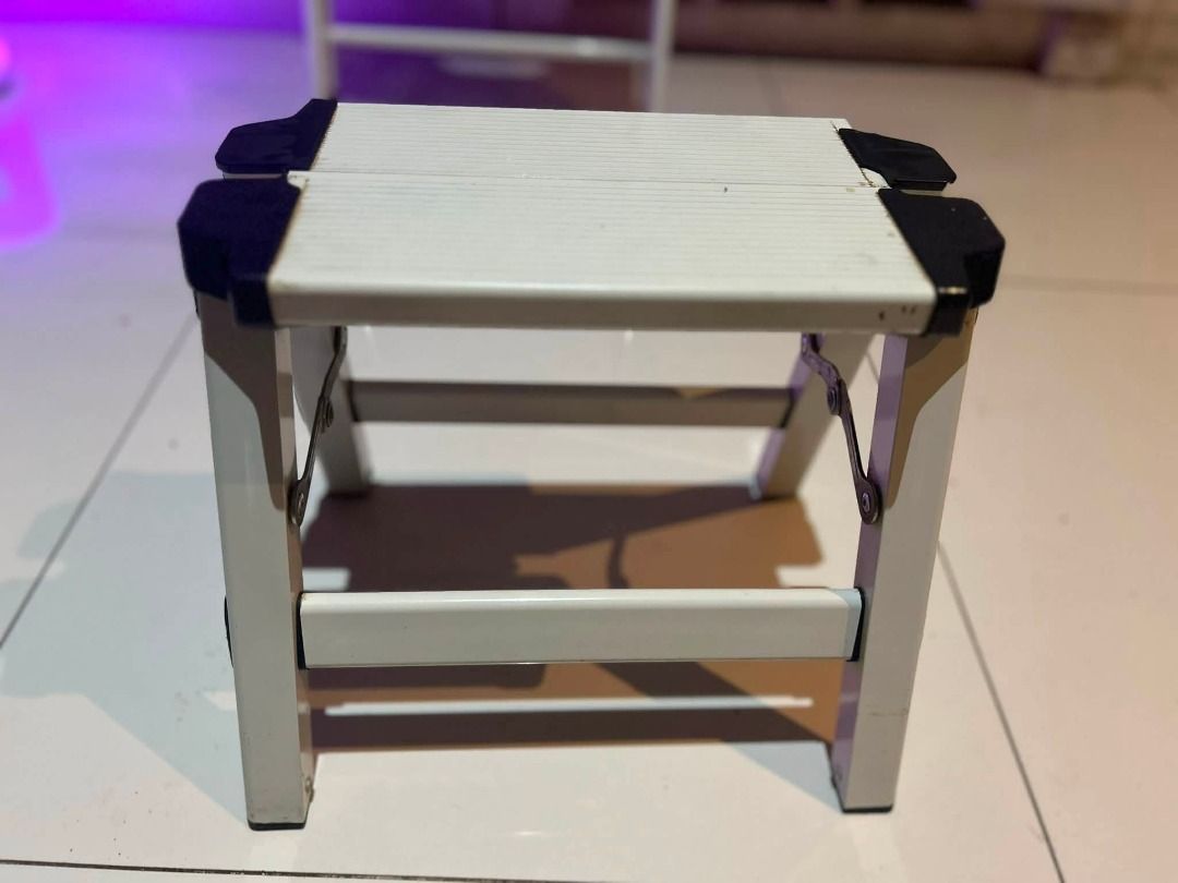 JAPAN 1ft step stool white aluminum ladder (Category: Chairs) located in Las Pinas. Submitted by rusc.rusc (Listing ID 1457514810, Image 1). Description: JAPAN 1ft step stool white aluminum ladder Good condtion -may pingas yung plastic cover part sa side pero sturdy Las Pinas near City Hall - Lightweight aluminum construction - Folds flat for convenient storage - Non-slip treads for secure footing - Rubber feet for enhanced stability - Compact an