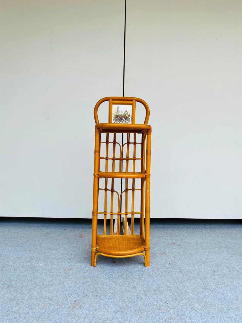 “JAPAN SURPLUS” RATTAN SIDE TABLE / TELEPHONE STAND (Category: Tables & Sets) located in Bulacan. Submitted by monmon555 (Listing ID 1457382344, Image 1). Description: “JAPAN SURPLUS” RATTAN SIDE TABLE / TELEPHONE STAND SIZE: 13L” x 11W” x 31-39H” inches (AS-IS ITEM) IN GOOD CONDITION.