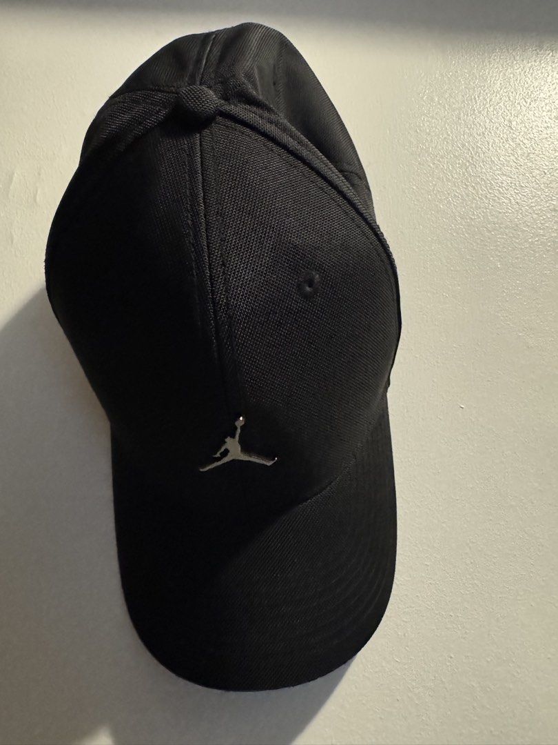 Jordan Cap Black Jumpman Logo (Category: Caps & Hats) located in Makati City. Submitted by hotstuff00 (Listing ID 1457479333, Image 2). Description: - Authentic Black Jordan Cap - Features the iconic Jumpman logo on the front - "Quality Inspired by the Greatest Player Ever" detail inside - Adjustable strap for a custom fit - Classic baseball cap style.