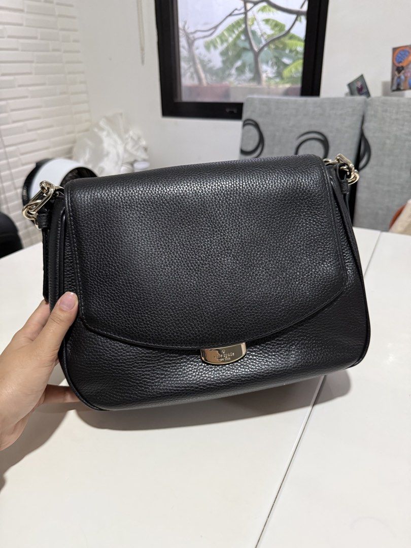 Kate Spade Black Leather Crossbody Bag (Category: Cross-body Bags) located in Cainta. Submitted by declutterwithaly (Listing ID 1457464800, Image 2). Description: - Brand: Kate Spade - Material: Black pebbled leather - Hardware: Gold details - Interior: Zip pocket, slip pockets - Strap: Adjustable - Condition: Clean inside and out - Perfect for: Everyday use.