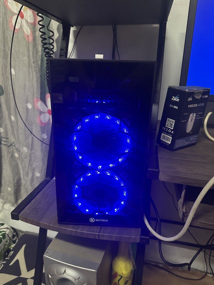 Keytech Desktop Computer Case with Blue LED Fans (Category: Desktops) located in Bulacan. Submitted by eardiente9 (Listing ID 1457452653, Image 1). Description: FOR SALE: SYSTEM UNIT 🖥️ Working and in good condition. System unit lang po wlang monitor Brand: Keytech Type: Desktop System Unit SPECS: • AMD PRO A12-8870E R7 Processor • 2.90GHz • 4 Cores • 8GB RAM • SOYO Motherboard • AMD Radeon R7 Graphics • Windows 10 Pro 64-bit • Glass Side Panel 