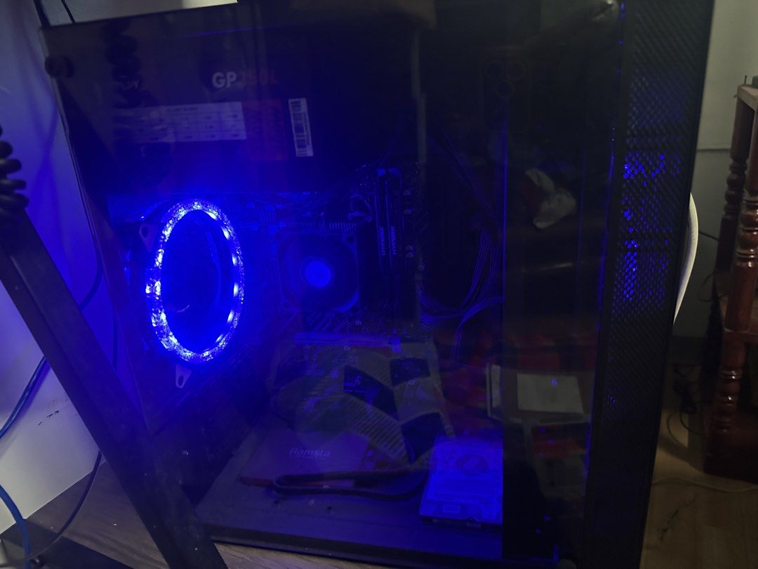 Keytech Desktop Computer Case with Blue LED Fans (Category: Desktops) located in Bulacan. Submitted by eardiente9 (Listing ID 1457452653, Image 2). Description: FOR SALE: SYSTEM UNIT 🖥️ Working and in good condition. System unit lang po wlang monitor Brand: Keytech Type: Desktop System Unit SPECS: • AMD PRO A12-8870E R7 Processor • 2.90GHz • 4 Cores • 8GB RAM • SOYO Motherboard • AMD Radeon R7 Graphics • Windows 10 Pro 64-bit • Glass Side Panel 
