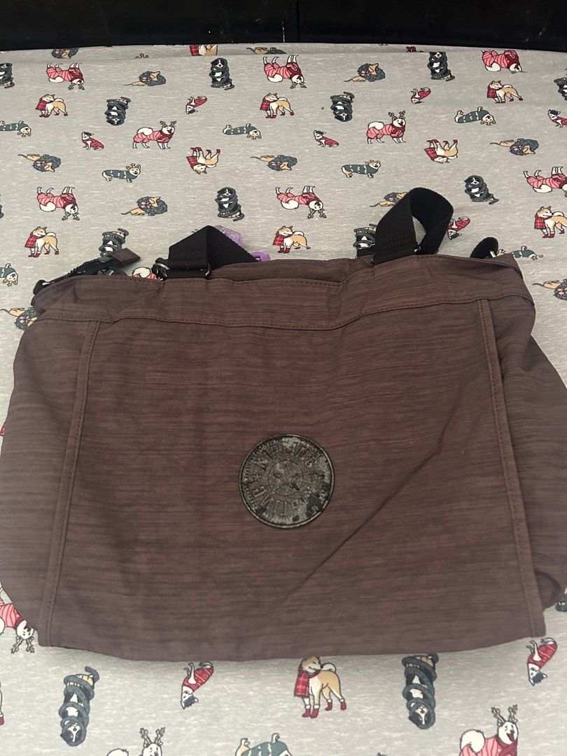Kipling Shoulder/Cross body bag (Category: Shoulder Bags) located in Manila. Submitted by lottiepot (Listing ID 1457357208, Image 2). Description: Kipling large shoulder/crossbody bag. Never used but with sign of tuklap na leather.