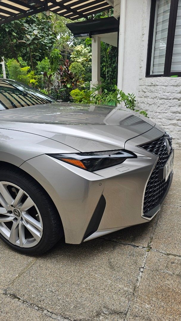 Lexus IS300H Executive Hybrid (A) (Category: Used Cars) located in Quezon City. Submitted by alexeibc (Listing ID 1457424495, Image 2). Description: I am selling my first owned pristine condition 2022 Lexus IS300h. The car was bought from Lexus BGC and it's under my name. It's has a hybrid engine. The body color is Sonic Titanium which is very beautiful in person. The car is barely used at just 6,1xx kilometers. It's basically a Sunday or Coding 
