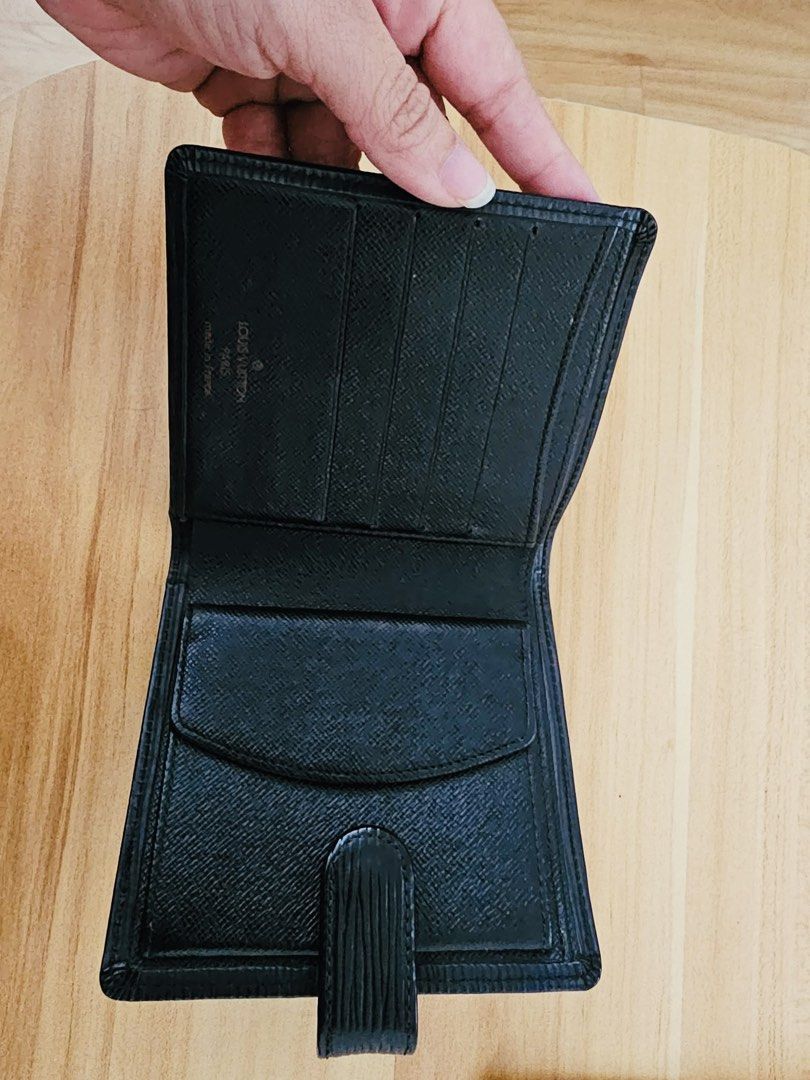 Louis Vuitton Epi Leather Wallet (Category: Luxury Bags & Wallets) located in Manila. Submitted by churchille32056 (Listing ID 1457475643, Image 3). Description: Authentic Louis Vuitton Epi Leather Bifold Wallet Classic Louis Vuitton bifold wallet in black Epi leather, in excellent condition. 100% authentic, with an Entrupy Certificate of Authenticity included for added confidence. Comes with the original Louis Vuitton dust bag. A timeless, under